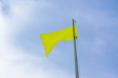 yellow flag flying on Gulf Shores & Orange Beach, Alabama